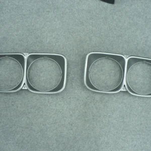 Mazda RX3 12A Charcoal Headlight Surrounds (Pair)